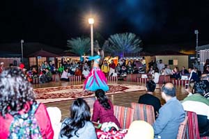 Belly Dance Performance during Night Desert Safari Dubai Tour